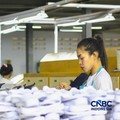 Ilustrasi pabrik sepatu. (CNBC Indonesia/Tias Budiarto)