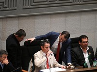 Bolivia's Vice President and President of the Plurinational Legislative Assembly Edmand Lara, drinks water while presiding over a session of the Plurinational Legislative Assembly, where the extension of the state of emergency for 90 days is being di