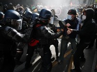 Protesters clash with French gendarmes, as French high school and university students attend a demonstration in Nantes as part of a nationwide day of protests and blockades to demand better school conditions in France, October 8, 2026. REUTERS/Stepha