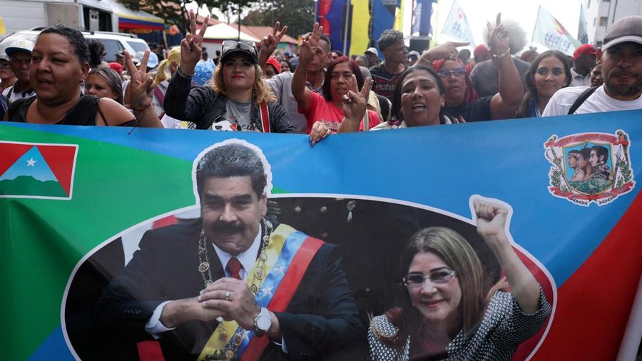 FILE PHOTO: Supporters of Venezuela's government rally to demand the release of ousted President Nicolas Maduro and his wife, Cilia Flores, two months after their capture by the U.S., in Caracas, Venezuela March 3, 2026. REUTERS/Leonardo Fernandez Vi