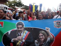 FILE PHOTO: Supporters of Venezuela's government rally to demand the release of ousted President Nicolas Maduro and his wife, Cilia Flores, two months after their capture by the U.S., in Caracas, Venezuela March 3, 2026. REUTERS/Leonardo Fernandez Vi