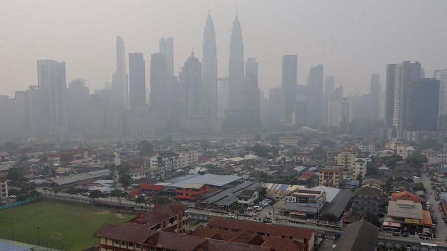 Kuala Lumpur's skyline shrouded in haze from regional wildfires, in Kuala Lumpur, Malaysia, October 9, 2026. REUTERS/Hasnoor Hussain