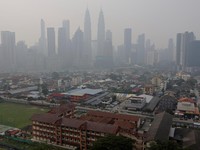 Kuala Lumpur's skyline shrouded in haze from regional wildfires, in Kuala Lumpur, Malaysia, October 9, 2026. REUTERS/Hasnoor Hussain