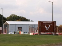 A sign at the entrance of RAF Molesworth, after two Latvian nationals were arrested on suspicion of entering a prohibited place for a purpose prejudicial to the UK, police said in a statement, in Cambridgeshire, Britain, October 8, 2026. REUTERS/Chri