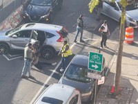 A man is detained after a shooting reportedly involving US Immigration and Customs Enforcement (ICE) officers in New York City, US, October 8, 2026.  in this screengrab obtained from a video. Stephanie/Handout via REUTERS    THIS IMAGE HAS BEEN SUPPL