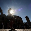 People walk outside the Colosseum as it is set to reopen today, after closing for a day as a mark of respect following the death of Andrea Moretti, a 22-year-old technician, in an overnight accident, in Rome, Italy, September 26, 2026. REUTERS/Yara N