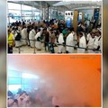Foto kombinasi menunjukkan rekaman CCTV orang-orang yang mengantre tepat sebelum serangan terjadi (atas), dan orang-orang yang bereaksi di tengah asap pada saat serangan terjadi (bawah), di Bandara Internasional King Khalid di Riyadh, Arab Saudi, 10