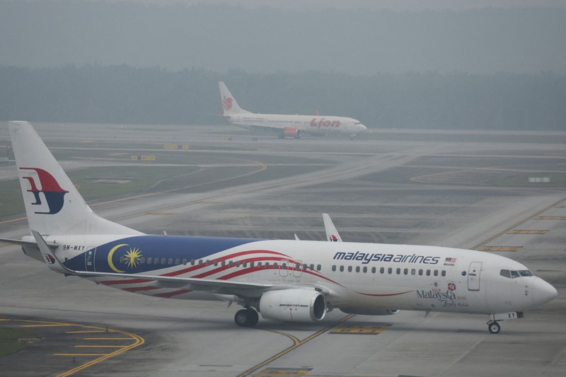 Kabut asap menyelimuti Bandara Internasional Kuala Lumpur di Sepang, Malaysia, Rabu (14/10/2026). (REUTERS/Hasnoor Hussain)