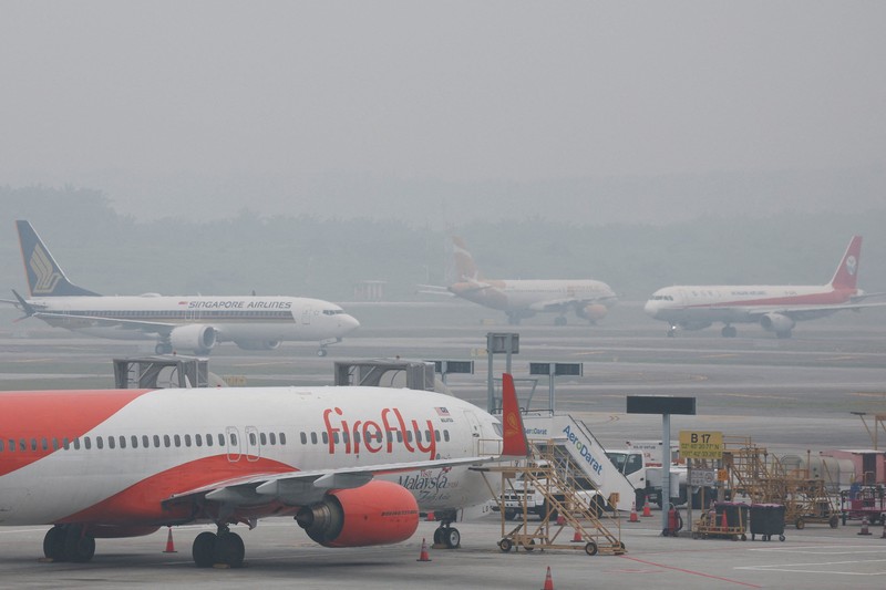 Kabut asap menyelimuti Bandara Internasional Kuala Lumpur di Sepang, Malaysia, Rabu (14/10/2026). (REUTERS/Hasnoor Hussain)