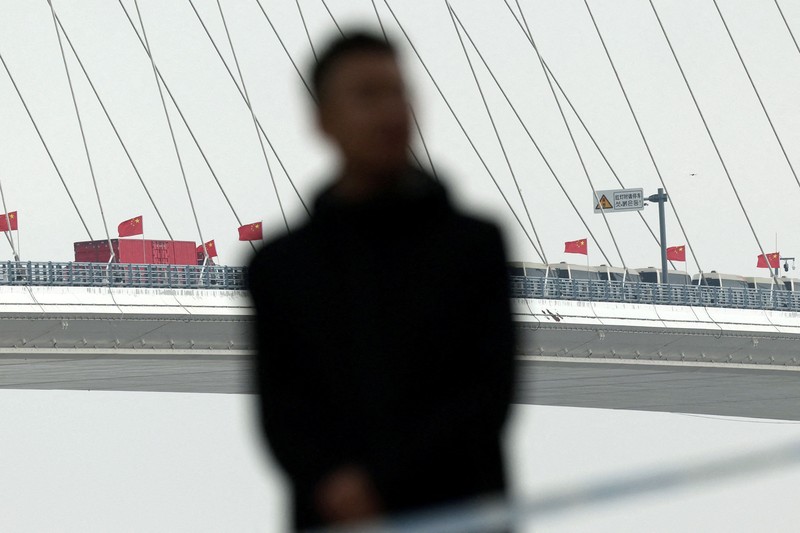 China dan Korea Utara secara resmi menandai pembukaan Jembatan Sungai Yalu Baru yang telah lama tertunda pada Kamis (15/10/2026). (REUTERS/Florence Lo)