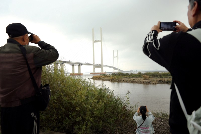 China dan Korea Utara secara resmi menandai pembukaan Jembatan Sungai Yalu Baru yang telah lama tertunda pada Kamis (15/10/2026). (REUTERS/Florence Lo)