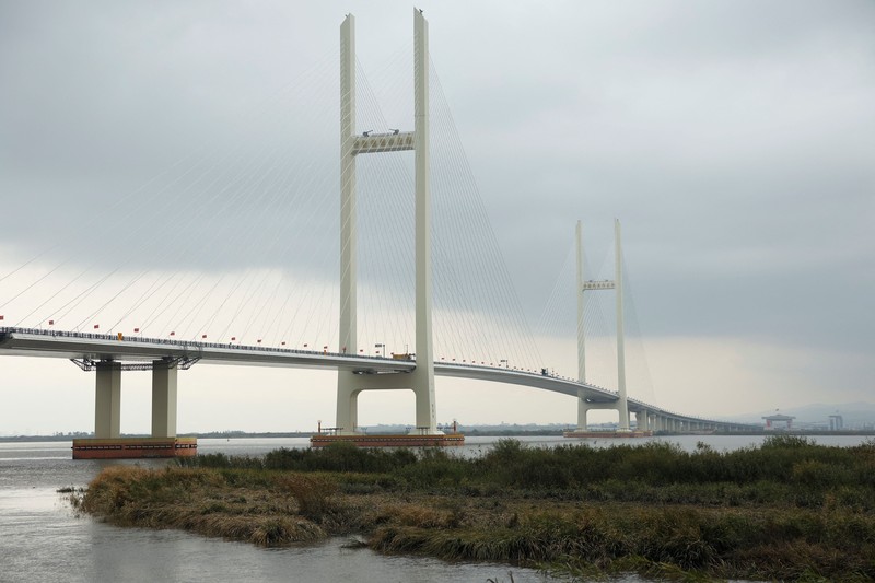China dan Korea Utara secara resmi menandai pembukaan Jembatan Sungai Yalu Baru yang telah lama tertunda pada Kamis (15/10/2026). (REUTERS/Florence Lo)