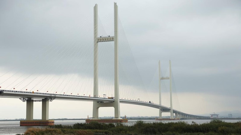 China dan Korea Utara secara resmi menandai pembukaan Jembatan Sungai Yalu Baru yang telah lama tertunda pada Kamis (15/10/2026). (REUTERS/Florence Lo)