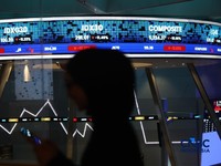 Layar menampilkan pergerakan Indeks Harga Saham Gabungan (IHSG) di Bursa Efek Indonesia, Jakarta, Jumat (16/10/2026). (CNBC Indonesia/Muhammad Sabki)