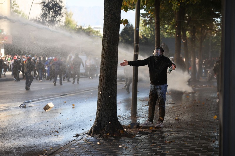 Protester wear masks, as Albanian students hold an anti-government protest in Tirana, Albania, October 19, 2026. REUTERS/Louisa Gouliamaki
