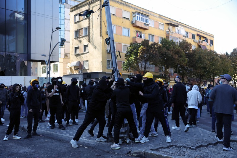 Protester wear masks, as Albanian students hold an anti-government protest in Tirana, Albania, October 19, 2026. REUTERS/Louisa Gouliamaki