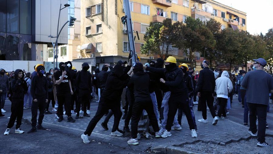 Protester wear masks, as Albanian students hold an anti-government protest in Tirana, Albania, October 19, 2026. REUTERS/Louisa Gouliamaki