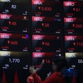 Layar menampilkan pergerakan Indeks Harga Saham Gabungan (IHSG) di gedung Bursa Efek Indonesia (BEI), Jakarta, Senin (19/10/2026).(CNBC Indonesia/Faisal Rahman)