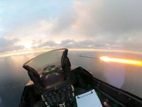 A view from the cockpit of a Romanian F-16 fighter jet during a mission to intercept and neutralize two drones that entered Romanian airspace without authorization on October 17, in this handout image provided by the Borcea 86th Air Base and released