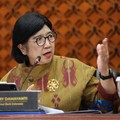 Gubernur Bank Indonesia, Destry Damayanti saat menyampaikan Hasil Rapat Dewan Gubernur Bulanan Bulan Oktober 2026 Cakupan Triwulanan dan Tahunan di Gedung Bank Indonesia, Jakarta, Rabu (21/10/2026). (CNBC Indonesia/Tri Susilo)