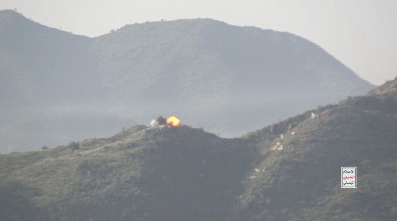 Members of Houthi military stand next to ordnance sitting on a hill amid what Houthi Military Media says are clashes between Houthi fighters and Saudi-backed Yemeni government forces in a location given as Taiz, Yemen, in this screengrab from a video released October 20, 2026. Houthi Military Media/Handout via REUTERS