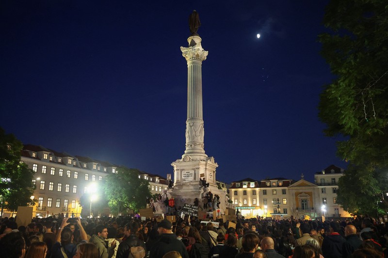 People at a protest camp Rossio square against house crisis and cost of living, in Lisbon, Portugal, October 19, 2026. REUTERS/Pedro Nunes