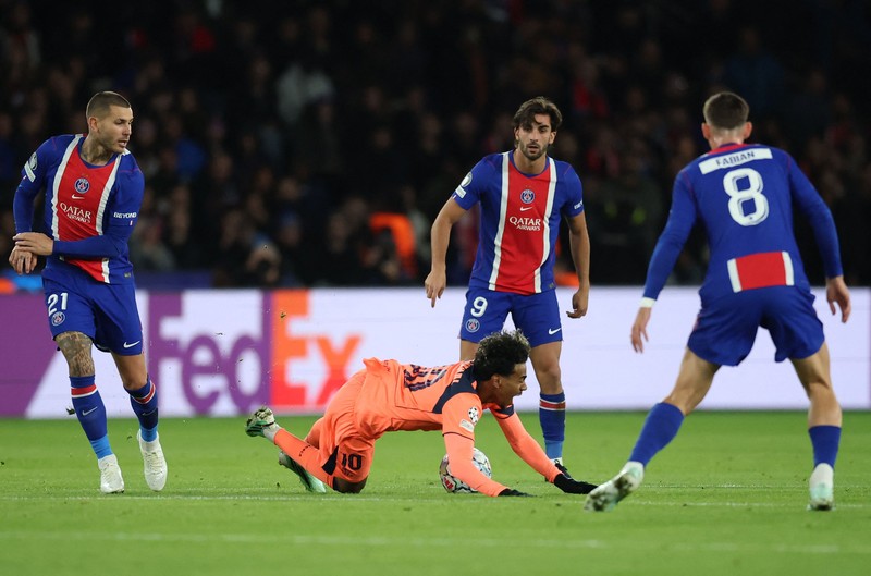 Soccer Football - UEFA Champions League - Paris St Germain v FC Barcelona - Parc des Princes, Paris, France - October 20, 2026  Paris St Germain's Desire Doue celebrates scoring their first goal REUTERS/Stephane Mahe