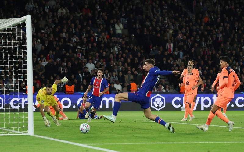 Soccer Football - UEFA Champions League - Paris St Germain v FC Barcelona - Parc des Princes, Paris, France - October 20, 2026  Paris St Germain's Desire Doue celebrates scoring their first goal REUTERS/Stephane Mahe