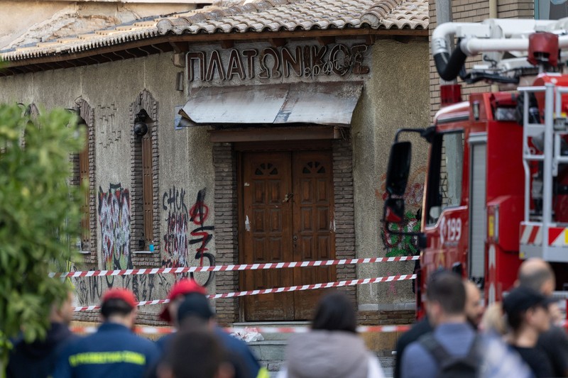 Police tape cordons off the site, following an explosion at a building in central Athens, in which police officers and members of the public were injured, in Athens, Greece, October 21, 2026. REUTERS/Stelios Misinas