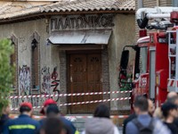 Police tape cordons off the site, following an explosion at a building in central Athens, in which police officers and members of the public were injured, in Athens, Greece, October 21, 2026. REUTERS/Stelios Misinas