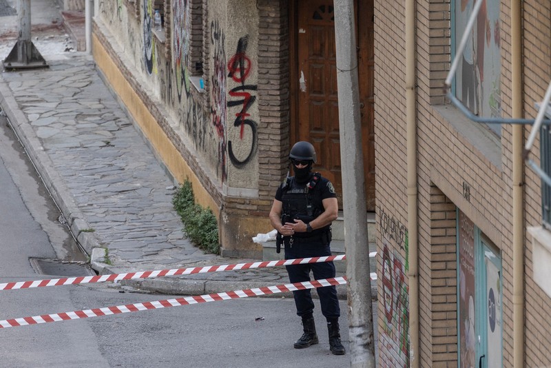 Police tape cordons off the site, following an explosion at a building in central Athens, in which police officers and members of the public were injured, in Athens, Greece, October 21, 2026. REUTERS/Stelios Misinas