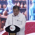 Menteri Koordinator Perekonomian, Airlangga hartarto memberi laporan kepada Presiden dalam Rakornas TPAKD Tahun 2026, Jakarta, 22 Oktober 2026. (Tangkapan Layar Youtube/Sekretariat Presiden RI)