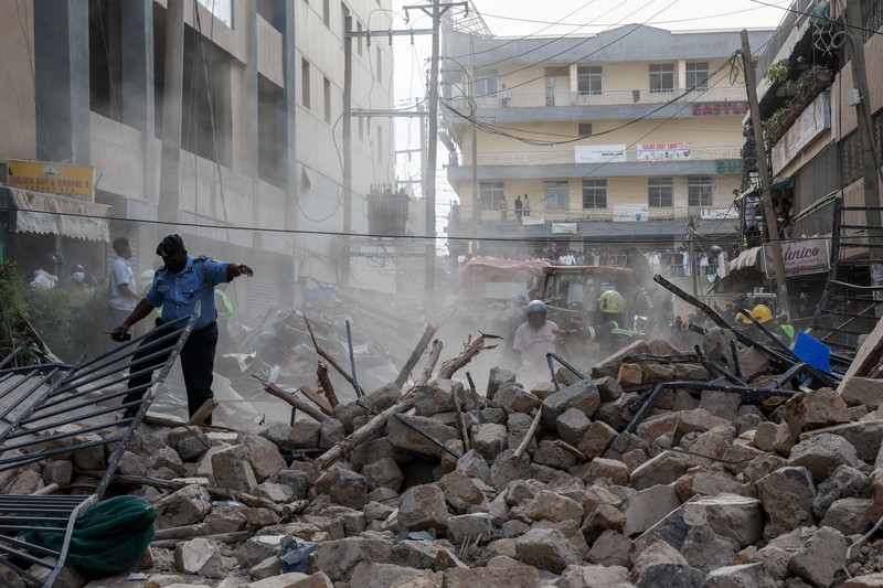 Emergency personnel work at the site of a building collapse in Eastleigh, Nairobi, Kenya, October 23, 2026. REUTERS/Monicah Mwangi   TPX IMAGES OF THE DAY