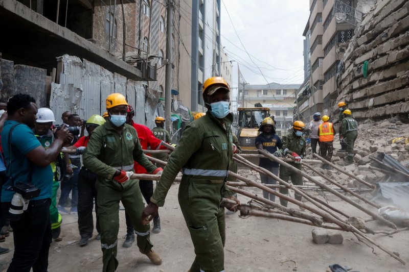 Emergency personnel work at the site of a building collapse in Eastleigh, Nairobi, Kenya, October 23, 2026. REUTERS/Monicah Mwangi   TPX IMAGES OF THE DAY