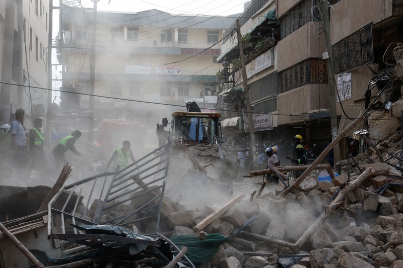 Emergency personnel work at the site of a building collapse in Eastleigh, Nairobi, Kenya, October 23, 2026. REUTERS/Monicah Mwangi   TPX IMAGES OF THE DAY