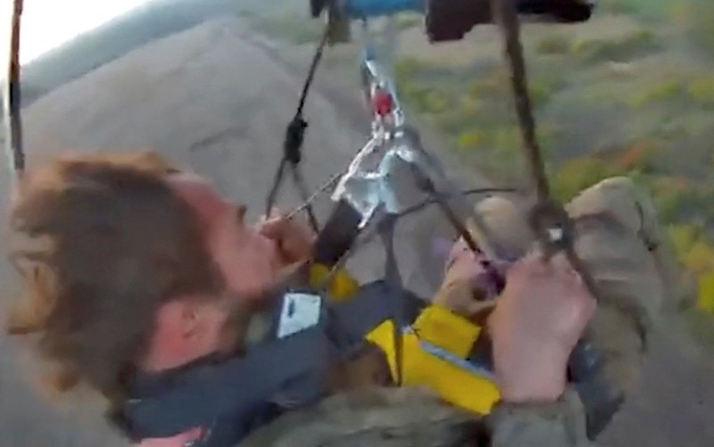 Ukrainian heavy drone rescues wounded Kostiantyn Vlasenko, 49, a serviceman with the 30th Mechanized Brigade of the Ukrainian Armed Forces, amid Russia's attack on Ukraine, in Kharkiv region, Ukraine, in this screengrab obtained from a handout video released October 19, 2026. Wounded Vlasenko was rescued by aerial drone after 491 days on frontline position. Ukrainian Armed Forces/Handout via REUTERS    THIS IMAGE HAS BEEN SUPPLIED BY A THIRD PARTY. BLURRED AT SOURCE. MANDATORY CREDIT