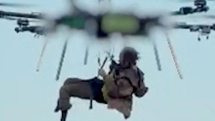 Ukrainian heavy drone rescues wounded Kostiantyn Vlasenko, 49, a serviceman with the 30th Mechanized Brigade of the Ukrainian Armed Forces, amid Russia's attack on Ukraine, in Kharkiv region, Ukraine, in this screengrab obtained from a handout video