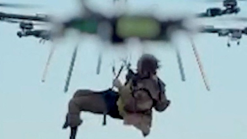 Ukrainian heavy drone rescues wounded Kostiantyn Vlasenko, 49, a serviceman with the 30th Mechanized Brigade of the Ukrainian Armed Forces, amid Russia's attack on Ukraine, in Kharkiv region, Ukraine, in this screengrab obtained from a handout video