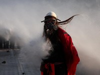 A water cannon sprays a protester during an anti-government protest by students in Tirana, Albania, October 24, 2026. REUTERS/Florion Goga        TPX IMAGES OF THE DAY