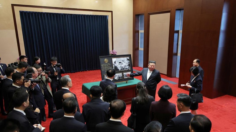 North Korean leader Kim Jong Un gestures during a visit to the Memorial Hall of the War to Resist US Aggression and Aid Korea in Dandong, Liaoning province, China, October 24, 2026, in this photo released by North Korea's Korean Central News Agency (