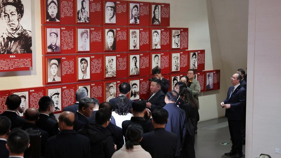 North Korean leader Kim Jong Un looks at an exhibition during a visit to the Memorial Hall of the War to Resist US Aggression and Aid Korea in Dandong, Liaoning province, China, October 24, 2026, in this photo released by North Korea's Korean Central