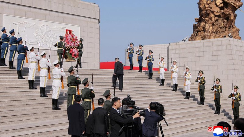North Korean leader Kim Jong Un attends a wreath-laying ceremony during a visit to the Memorial Hall of the War to Resist US Aggression and Aid Korea in Dandong, Liaoning province, China, October 24, 2026, in this photo released by North Korea's Kore
