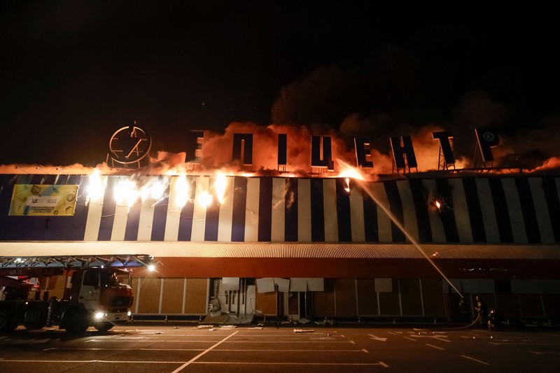 Firefighters work at the site of a household item shopping mall which was hit by Russian missile strikes, amid Russia's attack on Ukraine, in Kharkiv, Ukraine October 24, 2026. REUTERS/Sofiia Gatilova