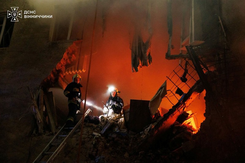 Firefighters work at the site of a household item shopping mall which was hit by Russian missile strikes, amid Russia's attack on Ukraine, in Kharkiv, Ukraine October 24, 2026. REUTERS/Sofiia Gatilova