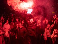 Supporters of the electoral list "Student List - Students Win" celebrate after Aleksandar Vucic, Serbian Progressive Party (SNS) prime ministerial candidate, conceded defeat in the parliamentary election in Belgrade, Serbia, October 25, 2026. REUTERS
