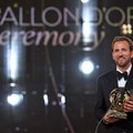 England and Bayern Munich forward Harry Kane reacts after receiving the Ballon d'Or award for the best male footballer during the 2026 Ballon d'Or France Football award ceremony at the Palladium Theatre in London on October 26, 2026. (Photo by FRANCK