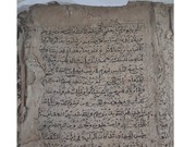 Di sebuah ruang koleksi di Direktorat Pengelolaan Koleksi Ilmiah (DPKI), Badan Riset dan Inovasi Nasional (BRIN), tersimpan sebuah mushaf Al-Quran berusia lebih dari tiga abad. (Dok. Yudo Utomo, DPKI)